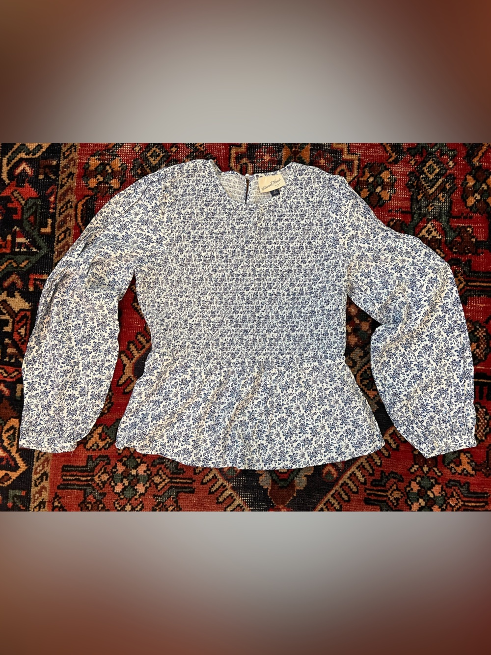 Smocked floral blouse